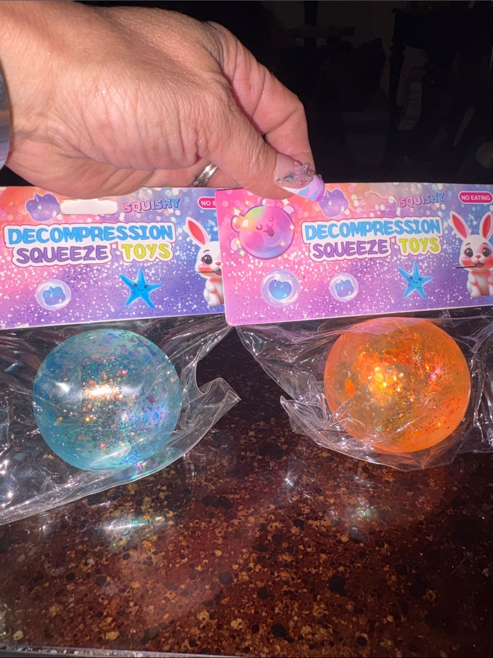 Decompression Squeeze Toys Avail Colors: Blue & Orange Glitter Stress Balls $6ea